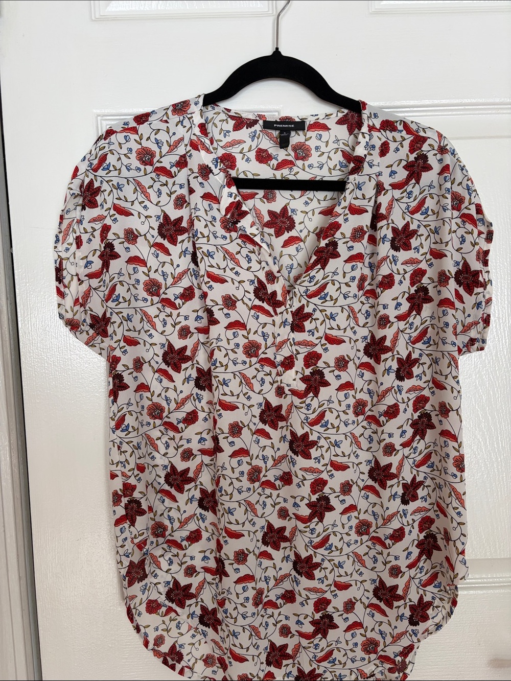 White Short-Sleeve Floral Blouse with Red Print